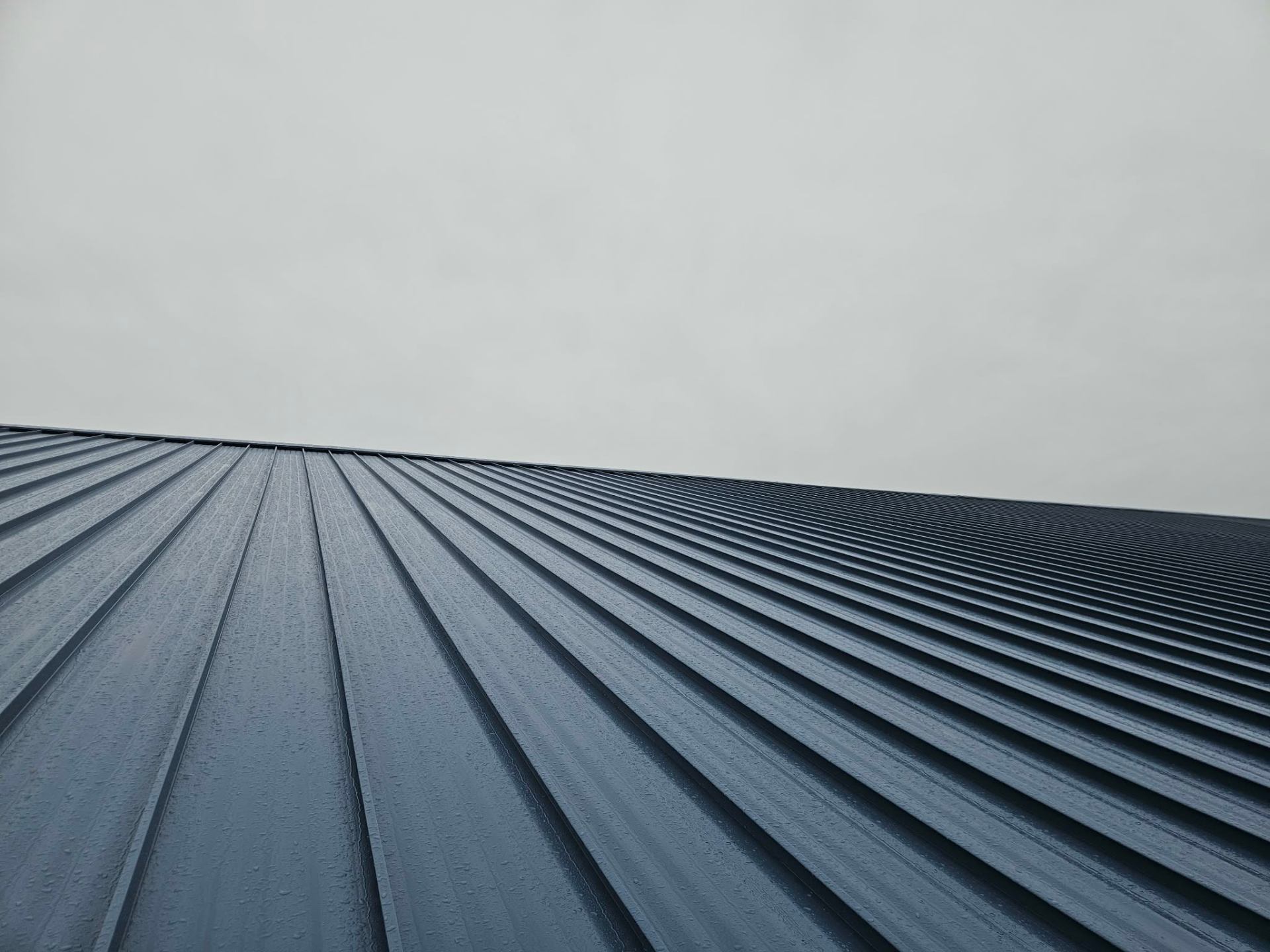 Close up of standing seam metal roof craftsmanship by Empire Roofing Systems
