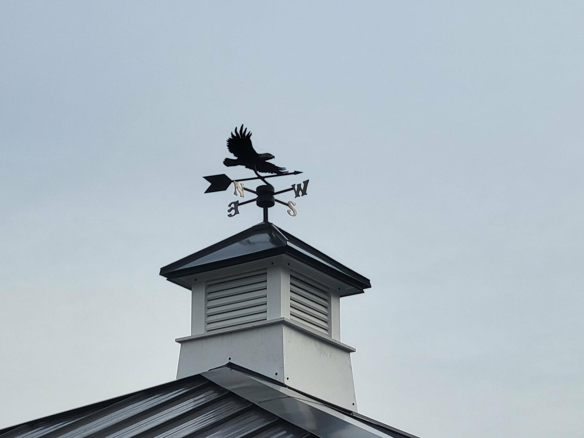 Custom cupola and weathervane detail on a Wenatchee Valley roof